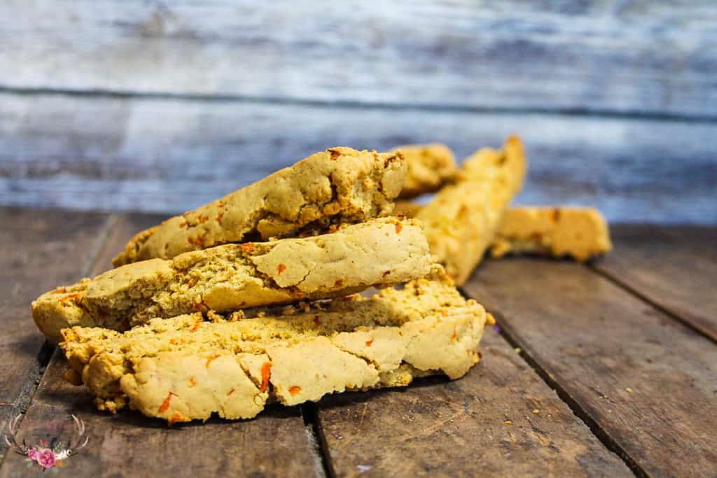 Carrot Cake Biscotti is a just like carrot cake but in a crunchy cookie form. We make our carrot cake biscotti without nuts but you can easily add in walnuts or pecan if you like. These are the perfect biscotti.