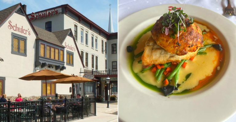 A warm, upscale dining room in Michigan featuring traditional decor and white tablecloths