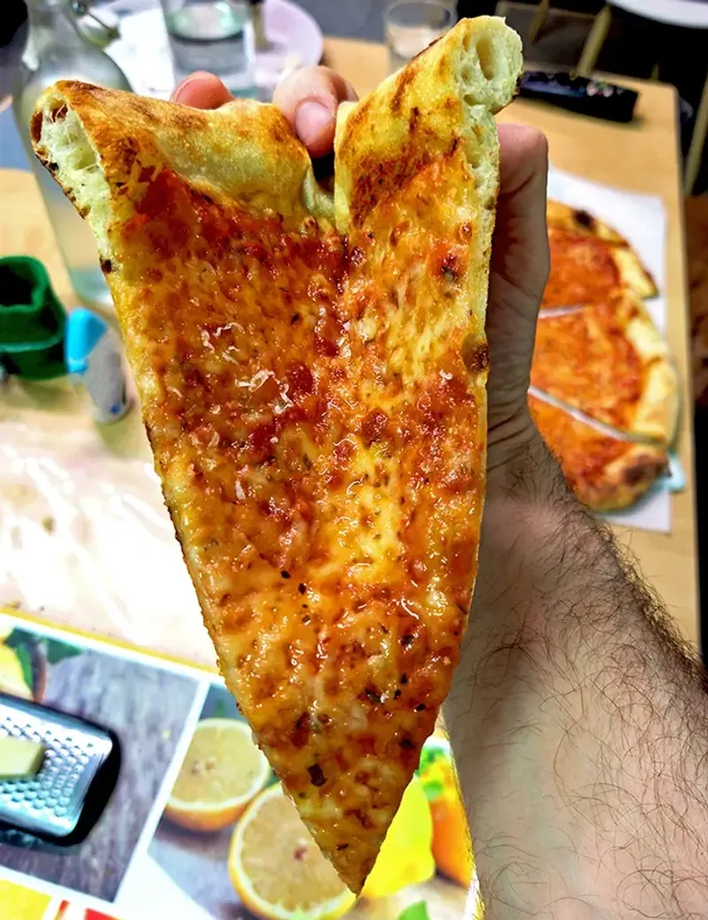 The Sacred Pizza Fold