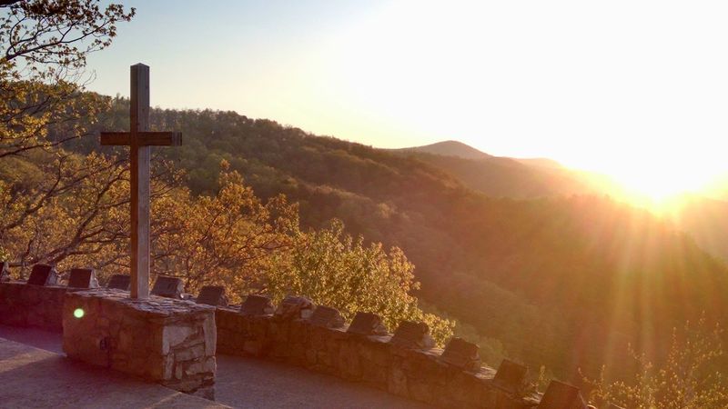 The Iconic Cross That Anchors The Whole Experience