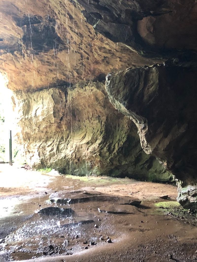 A Shelter Of Stone Marked With Ancient Symbols