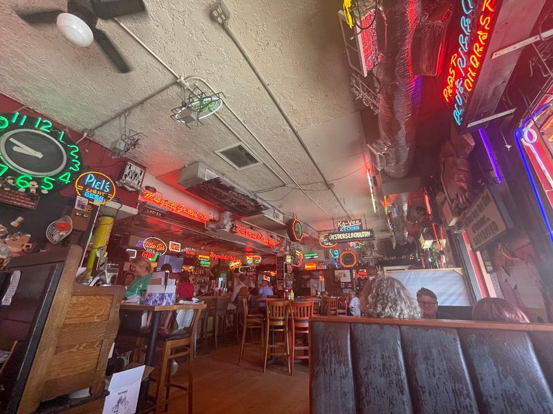 The Neon-Lit Atmosphere That Sets the Mood