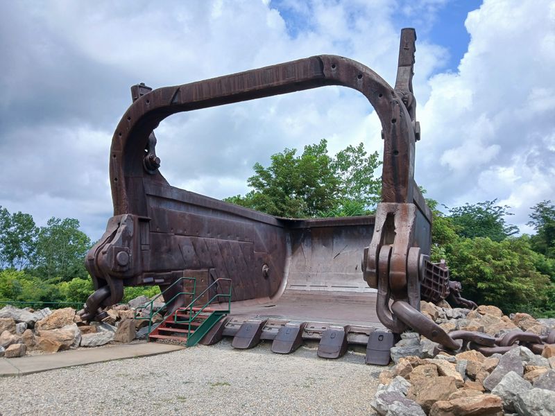 Standing Before A Monument To Industrial Might