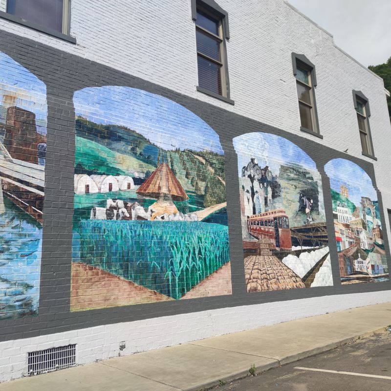 Murals That Hold The River’s Memory