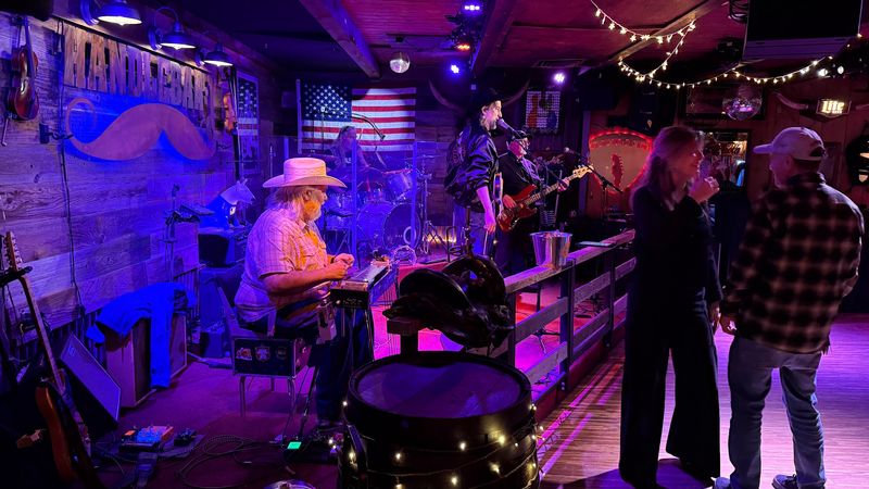 A Crowd of Locals and Real Cowboys