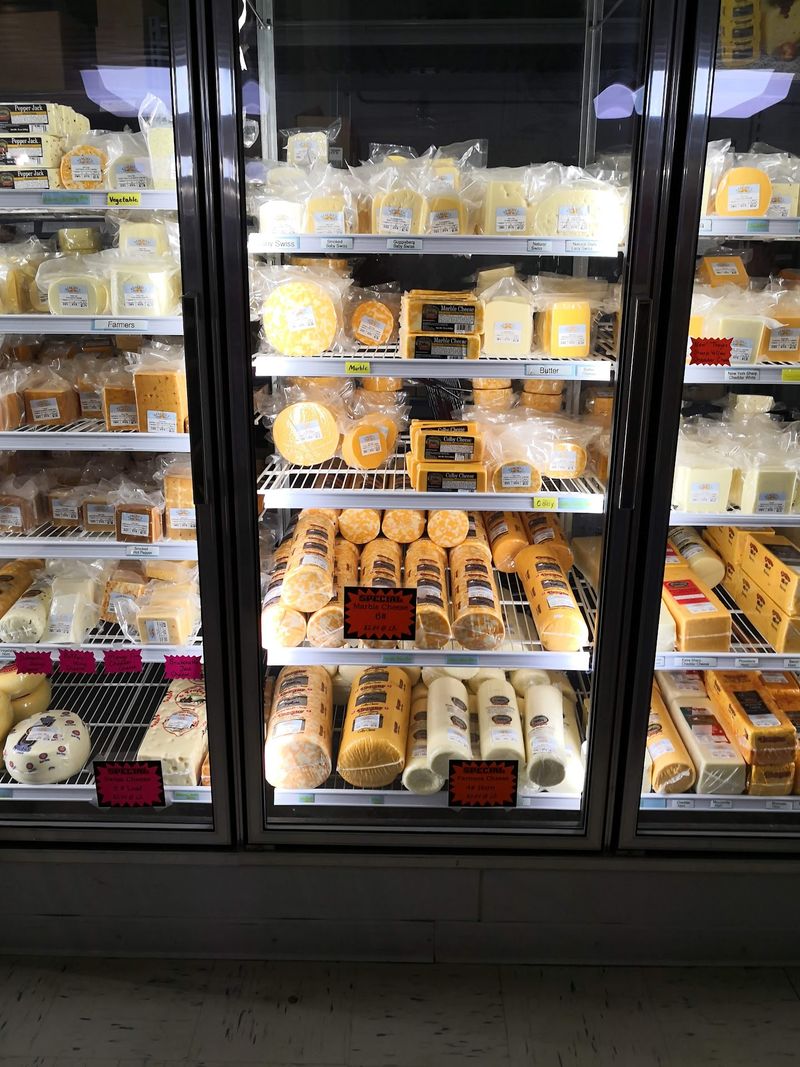 A Deli Counter Loaded With Cheese Curds And Sliced Favorites A Deli Counter Loaded With Cheese Curds And Sliced Favorites