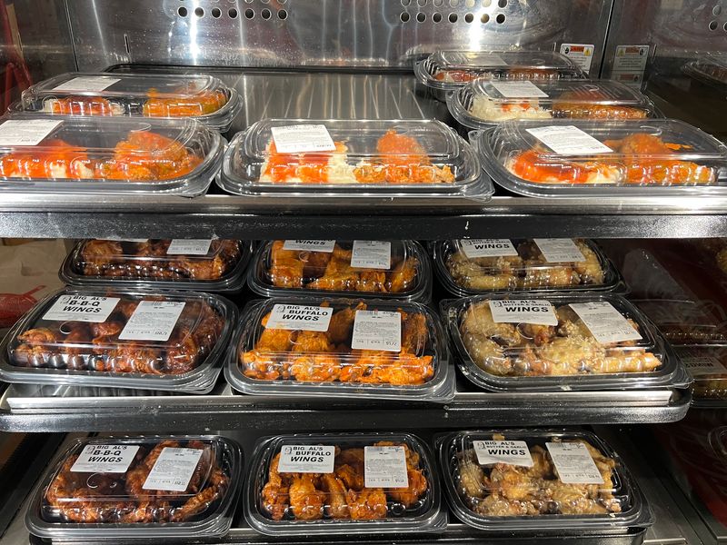A Deli Counter With Hot Food Ready to Go A Deli Counter With Hot Food Ready to Go