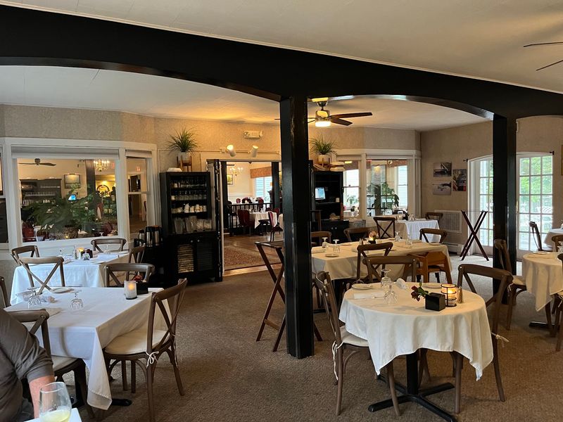 A Farmhouse Dining Room With Piano Music