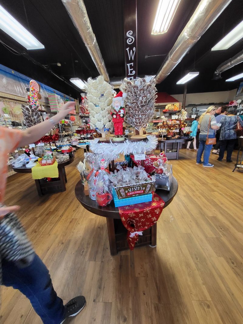 A Festive Shop With A Flying Train