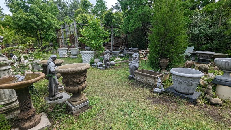 A Garden Area Filled With Outdoor Antiques Worth Exploring