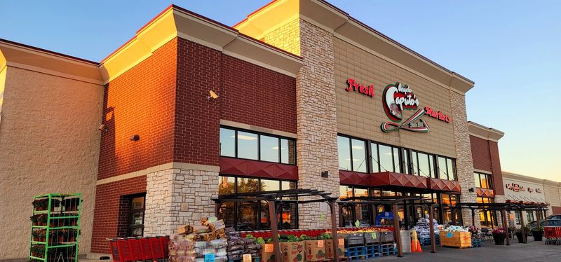 A Grocery Store With An Honorary Street Name Out Front