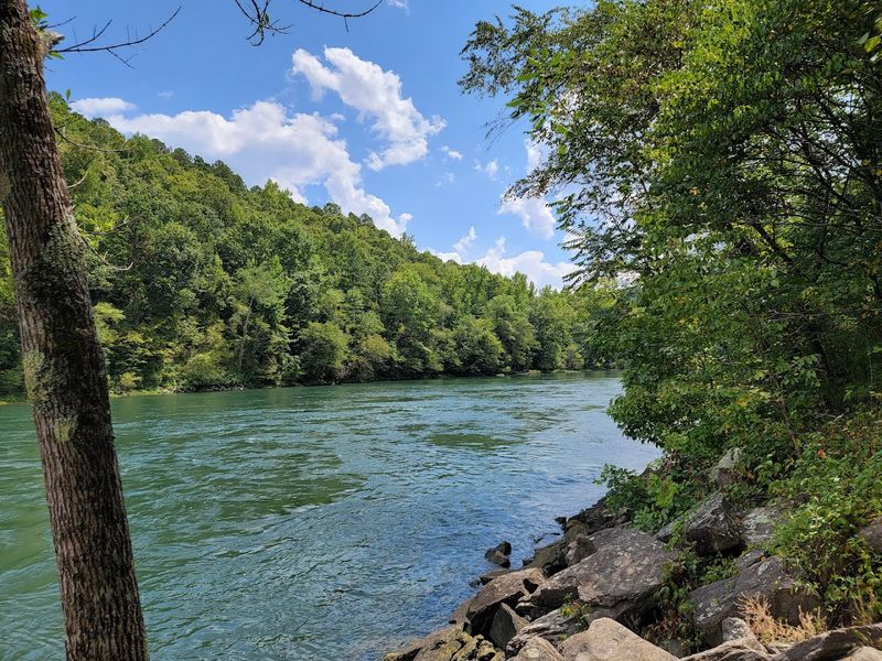A Hidden Beach With A Slow Lake Rhythm