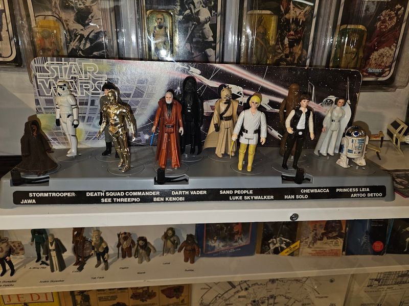 Floor To Ceiling Shelves Of Vintage Action Figures And Collectibles