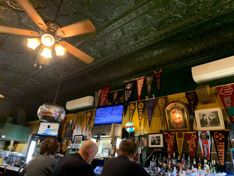 Tin Ceilings, Warm Wood, And Lived-In Charm