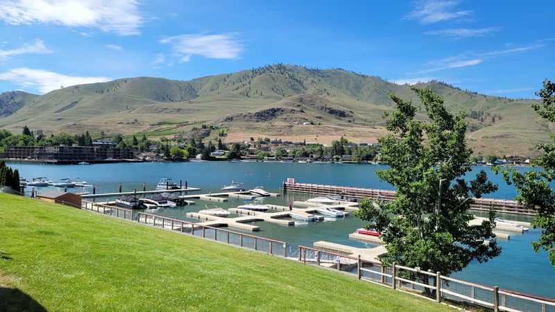 A Little Town Perched At The Very Tip Of A Giant Lake