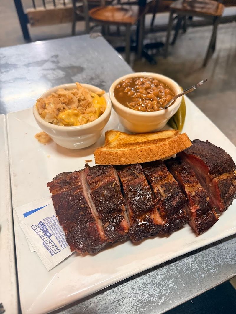 Pit Smoke Rolling From Dawn Until Late Afternoon