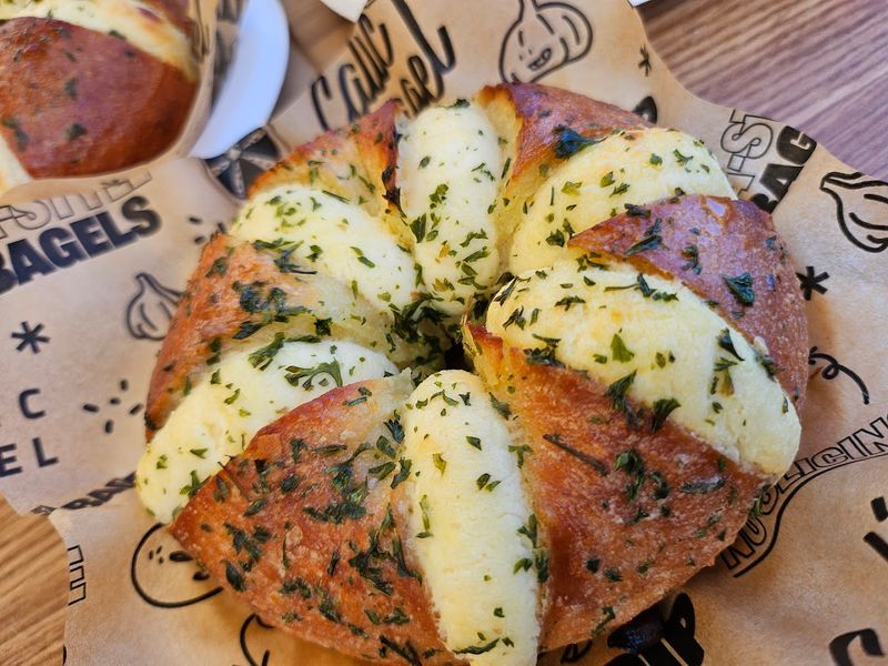 The Signature Calic Garlic Bagel Is A Legend