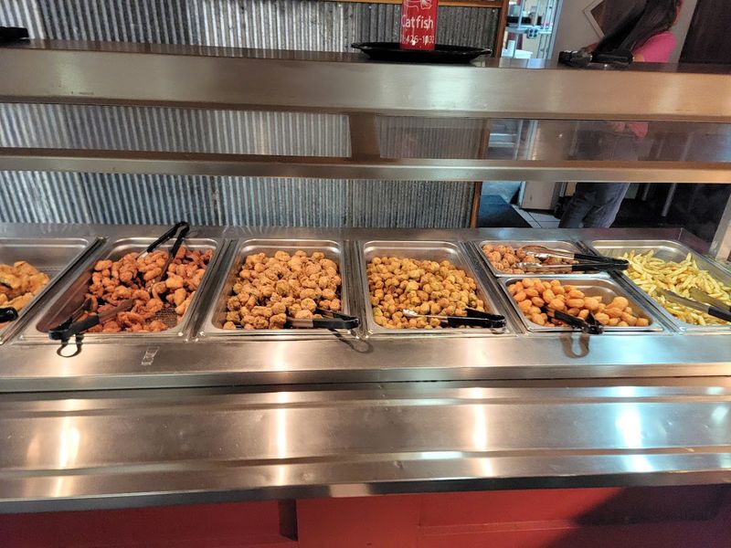A Buffet Line Centered On Fried Catfish And Southern Staples