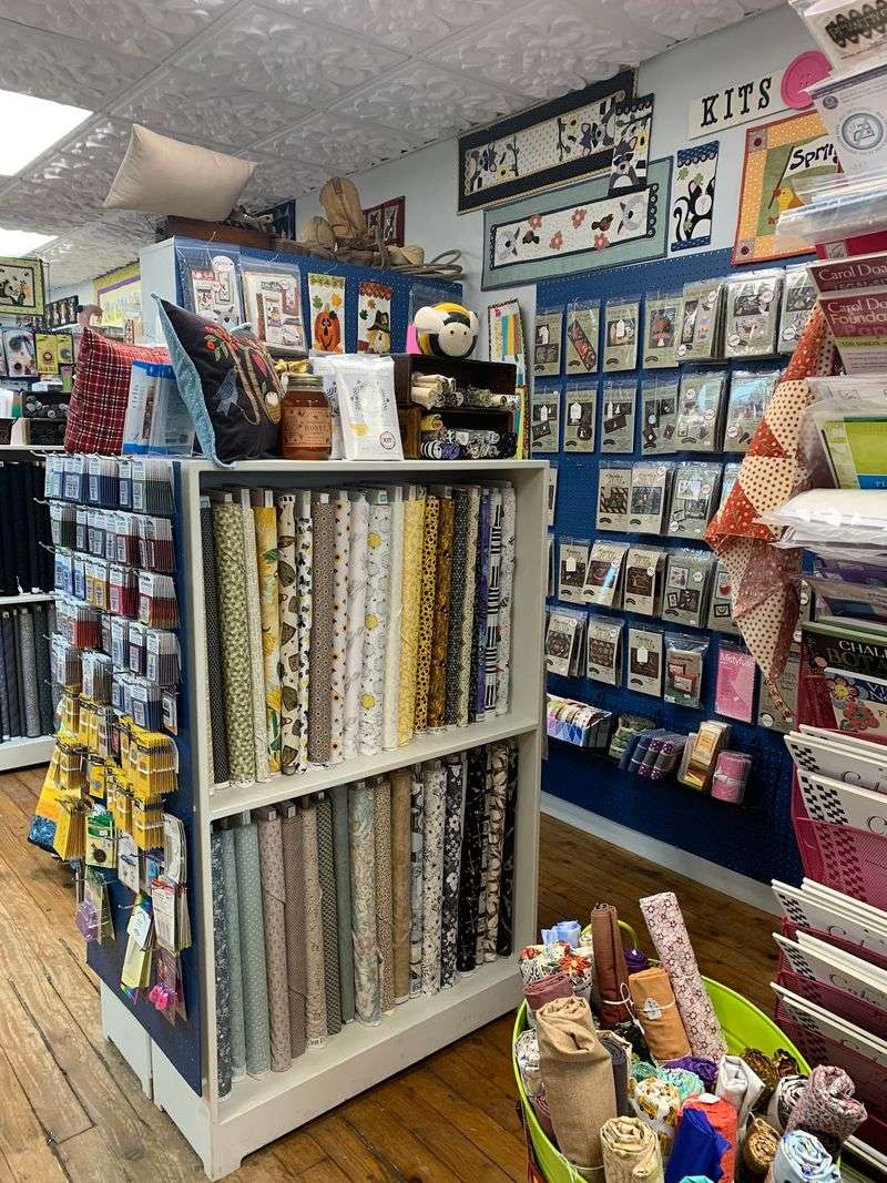 A Quilt Shop With More Than Fabric On The Shelves