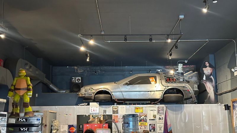 A Real DeLorean Parked Inside The Cafe A Real DeLorean Parked Inside The Cafe
