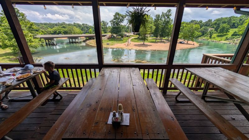 A Relaxed Deck Above The Spring River