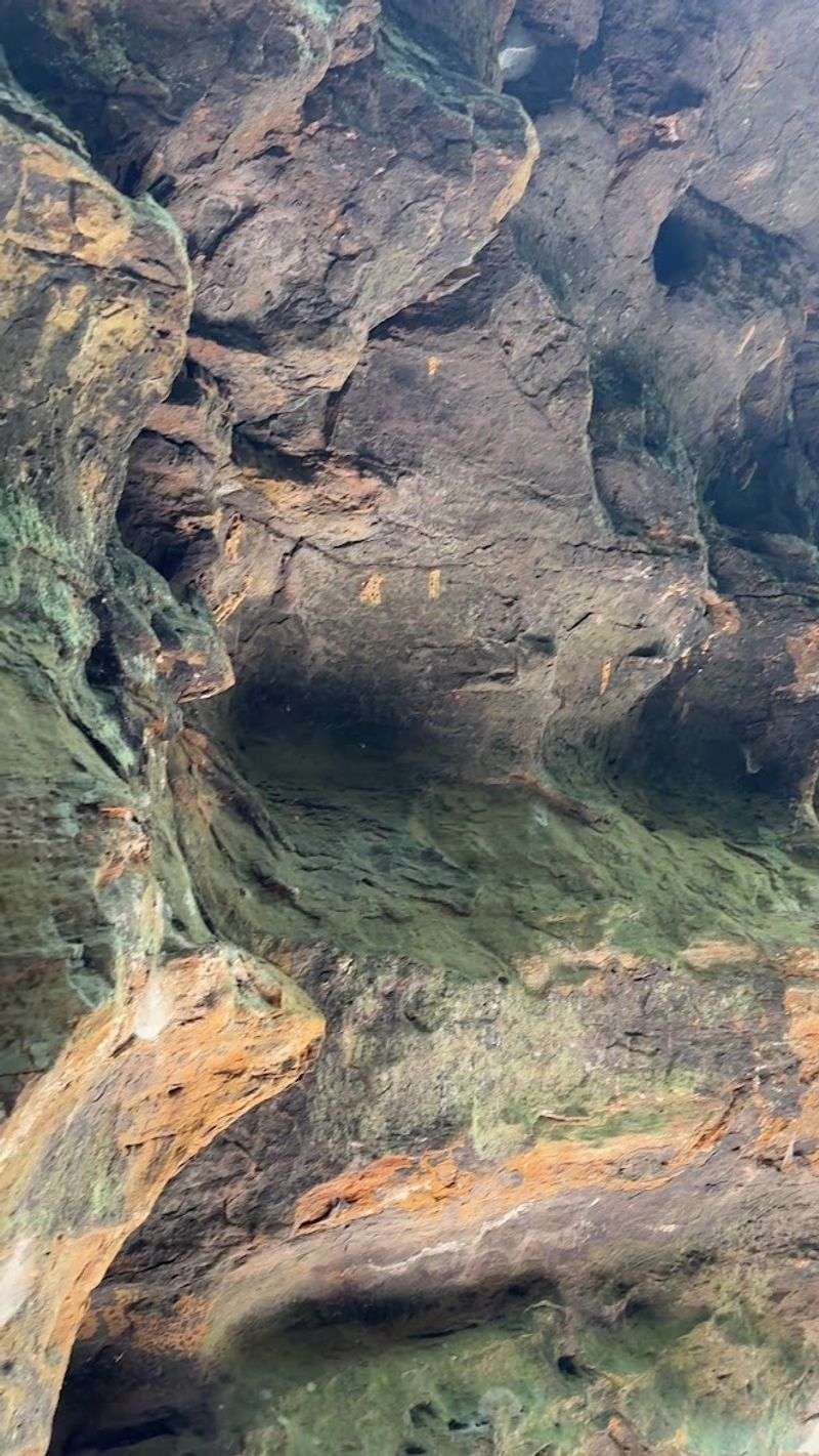 Towering Bluff Walls Carved With Honeycomb Patterns