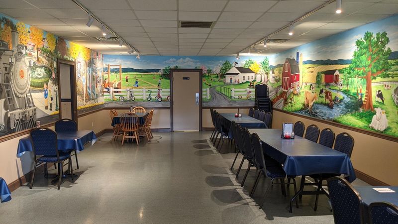 A Spotless Room With A Mural And Peach Tea