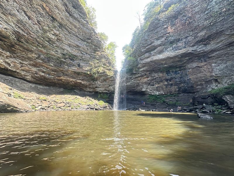 A Hidden Cascade Carved Into Sandstone Cliffs