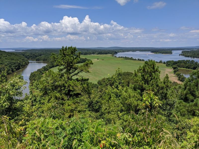 Sweeping Views Stretching Across Water And Distant Ridges