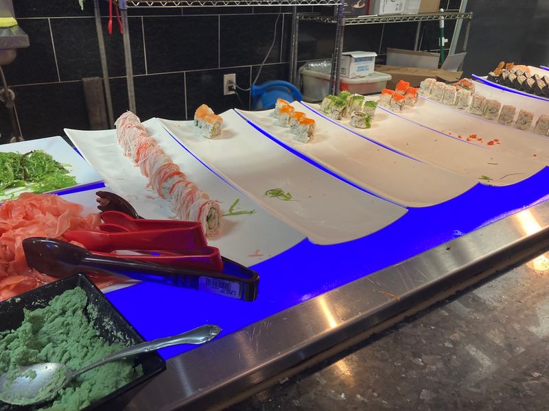 A Sushi Bar Rolling With Color And Choices A Sushi Bar Rolling With Color And Choices