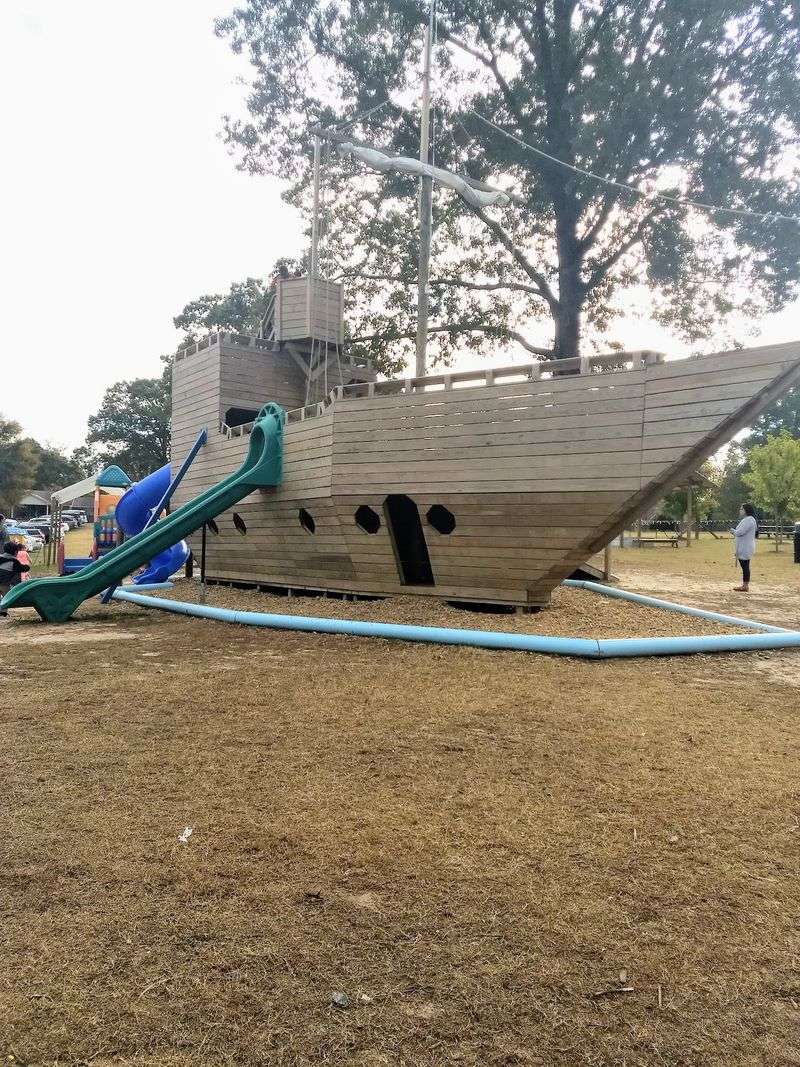 A Three-Level Pirate Ship Towers Over The Farm