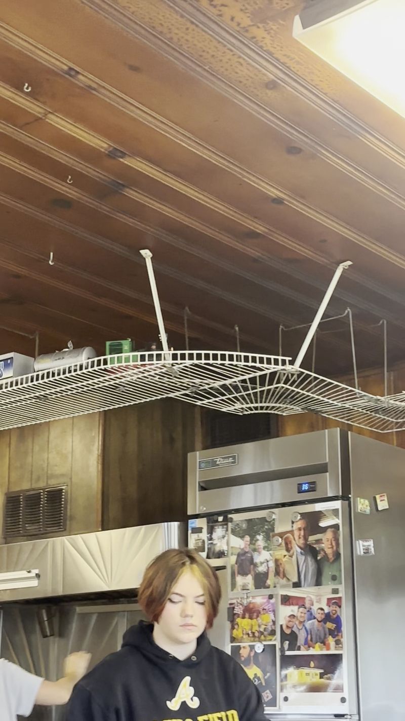 A Toy Train Chugging Overhead