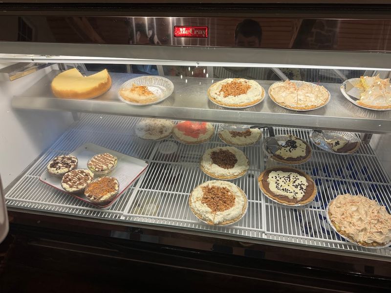 A Bakery Case Filled With Freshly Made Temptations