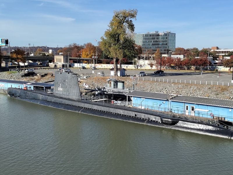 A Wartime Giant Moored Along The River