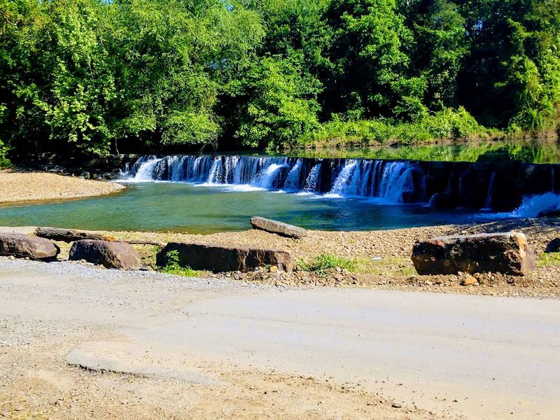 A Wide Rock Ledge With Flowing Water A Wide Rock Ledge With Flowing Water