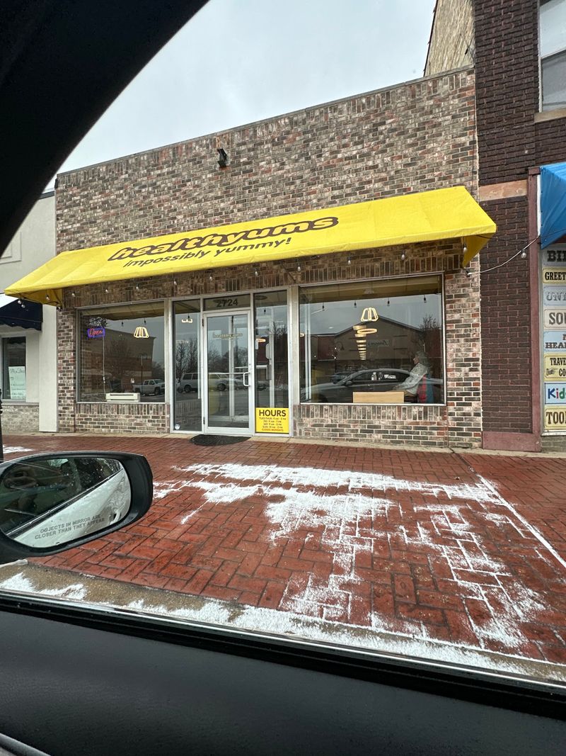 A Yellow Awning On Sheridan Road In Zion