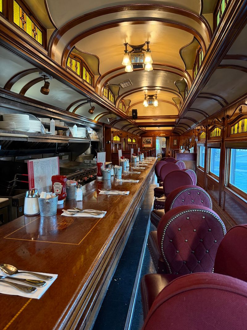 All Aboard For Breakfast In A Bright Red Train Car