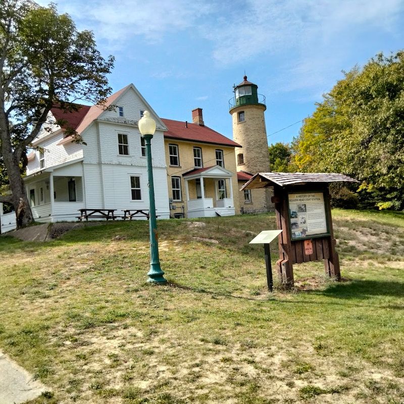 Whiskey Point Lighthouse And The Working Harbor
