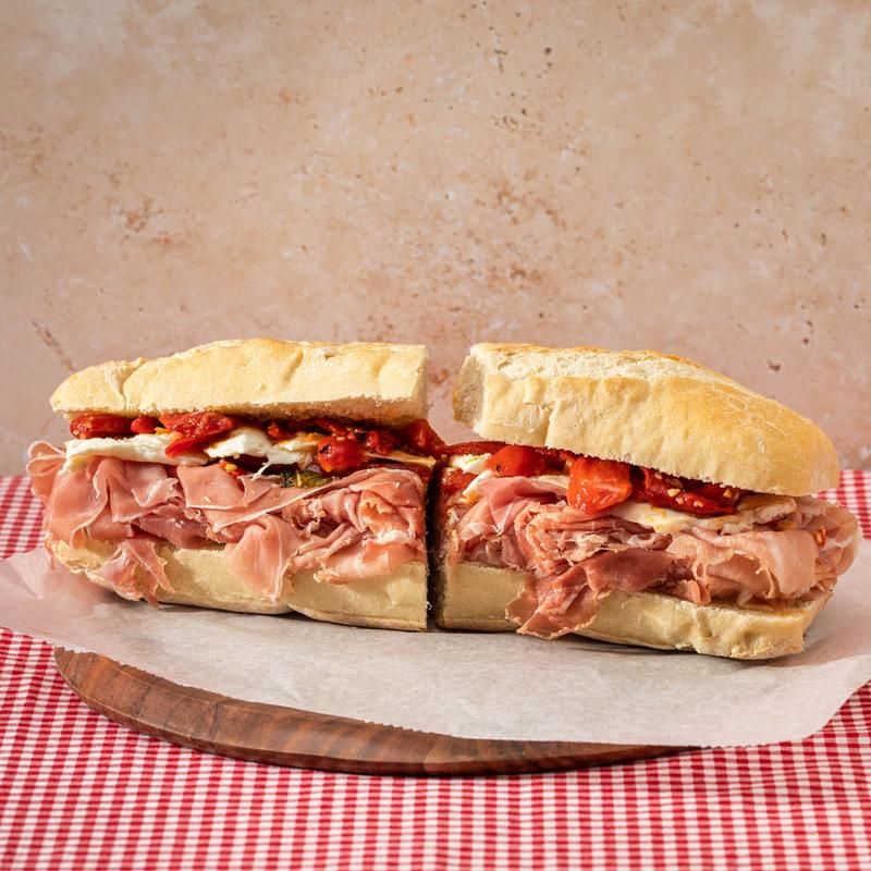 An Italian Sub Stacked With Cured Meats