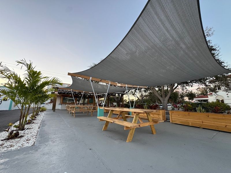 An Outdoor Dining Setup That Feels Like A Florida Afternoon Dream