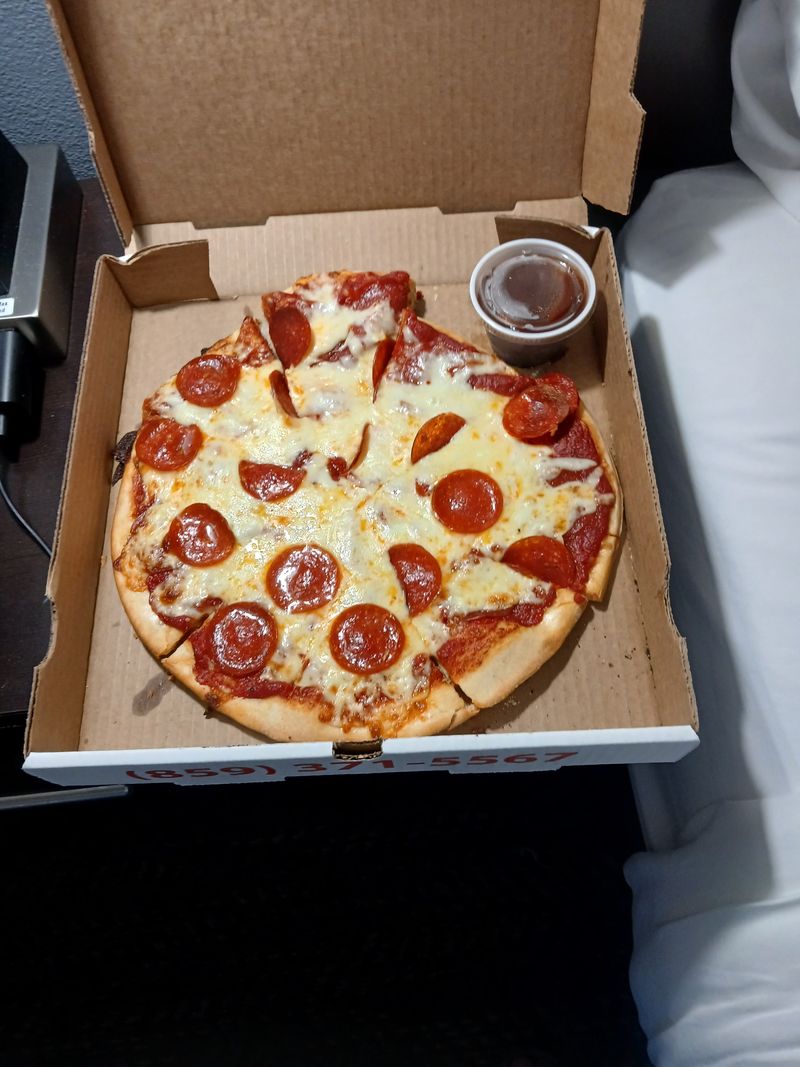 Tom's Papa Dino's Pizza