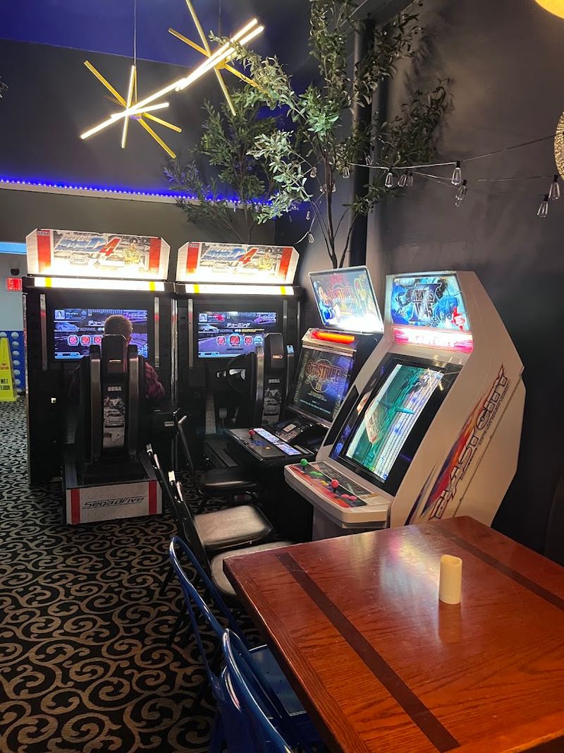 Arcade Cabinets In The Back Room
