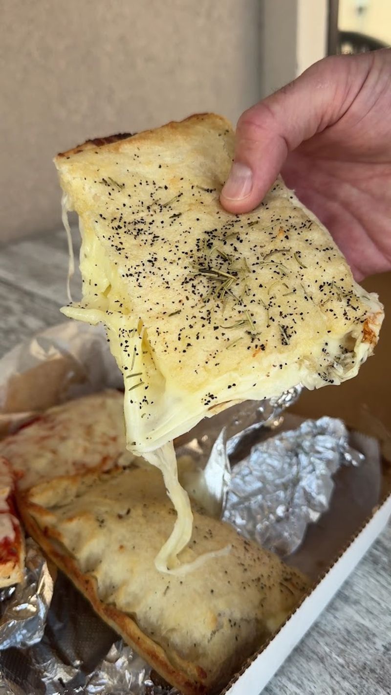 The White Pizza Here Is a Double-Crust Cheese Lover's Dream