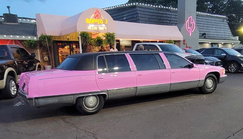 Arrive In Style With The Free Pink Cadillac Limo Pickup