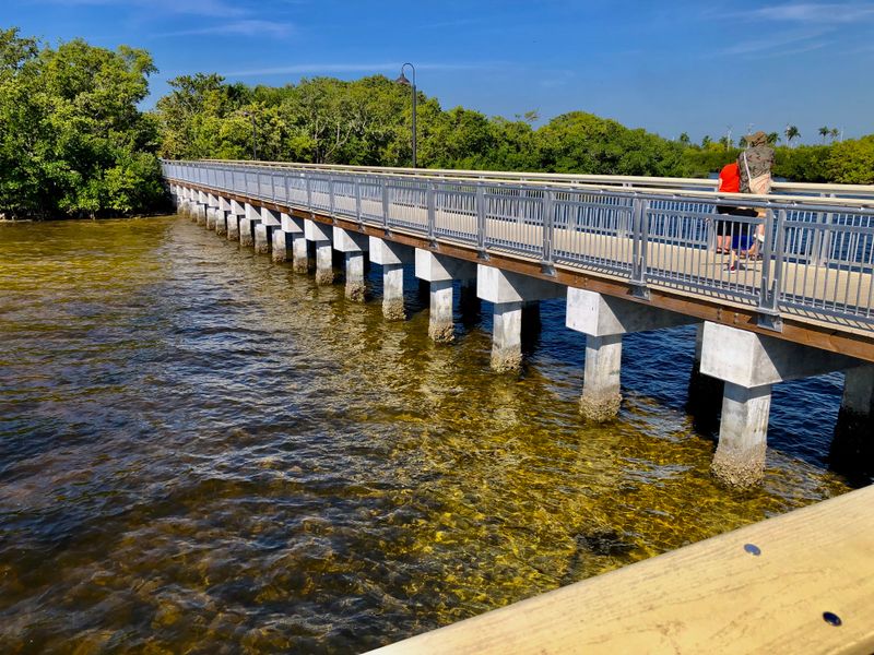 Fishing From The Bridge And Waterfront That Defines Island Life