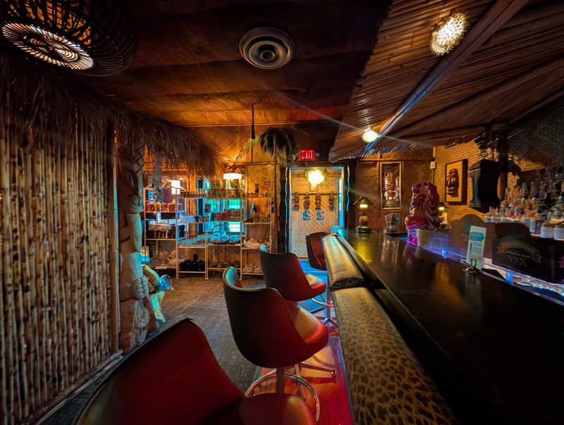 Bamboo Walls And Carved Wooden Masks