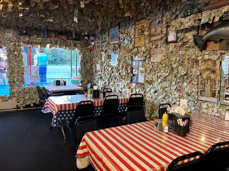 Fat Smitty's: Dollar Bills On The Walls And Stacked Burgers On The Plate