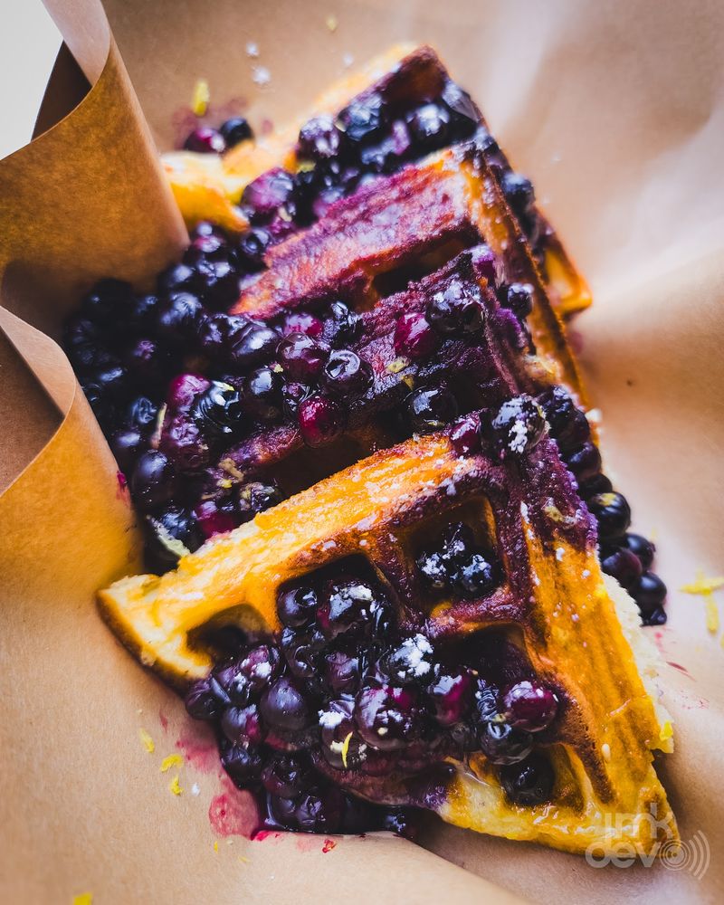 Blueberries, Maple, And Lemon Walk Onto A Waffle