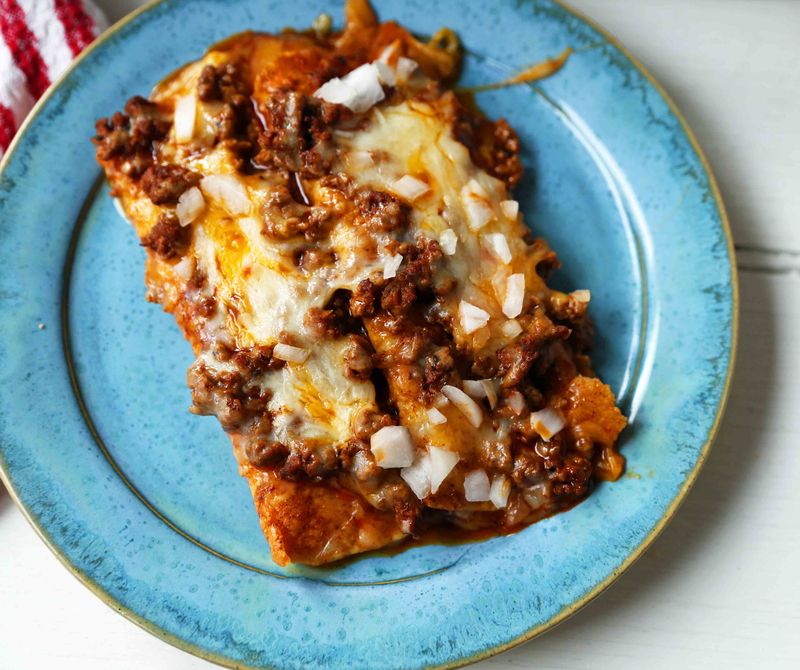 Tex-Mex Enchiladas: Cheese-Drenched Delight