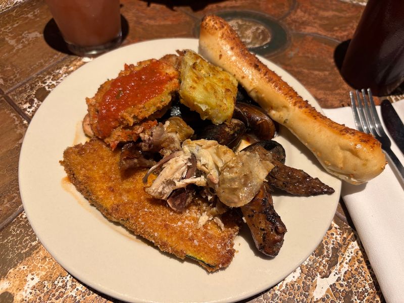 Calamari, Ribs, And Rotisserie Chicken Walk Into A Buffet